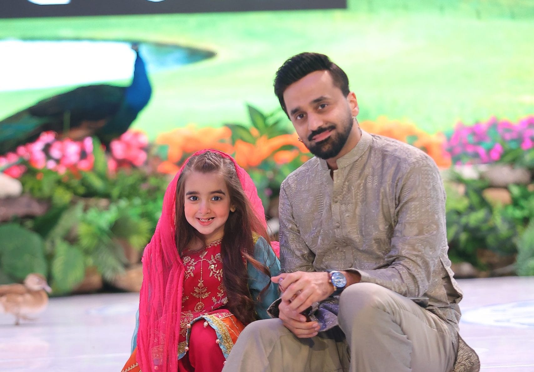 Global digital sensation and Pakistan's top child star Zartasha Kashif (Tashu) sitting alongside renowned anchor Waseem Badami on the set of ARY Digital's Shan-e-Ramzan. Highlighting her historic 24-day television appearance, spreading joy, family values, and positive youth influence worldwide.