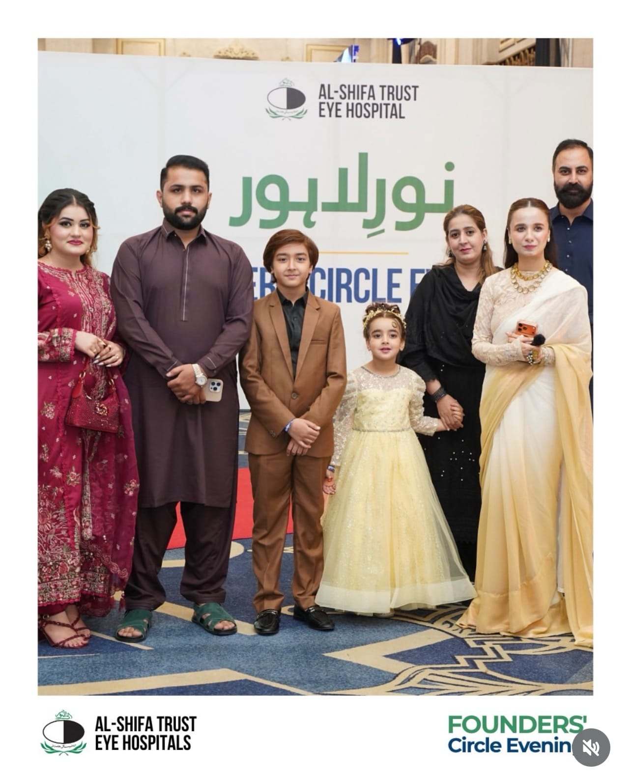 Zartasha Kashif (Tashu), recognized as the World's Youngest Humanitarian, standing on stage at an official event representing her NGO, Hope With Tashu.
