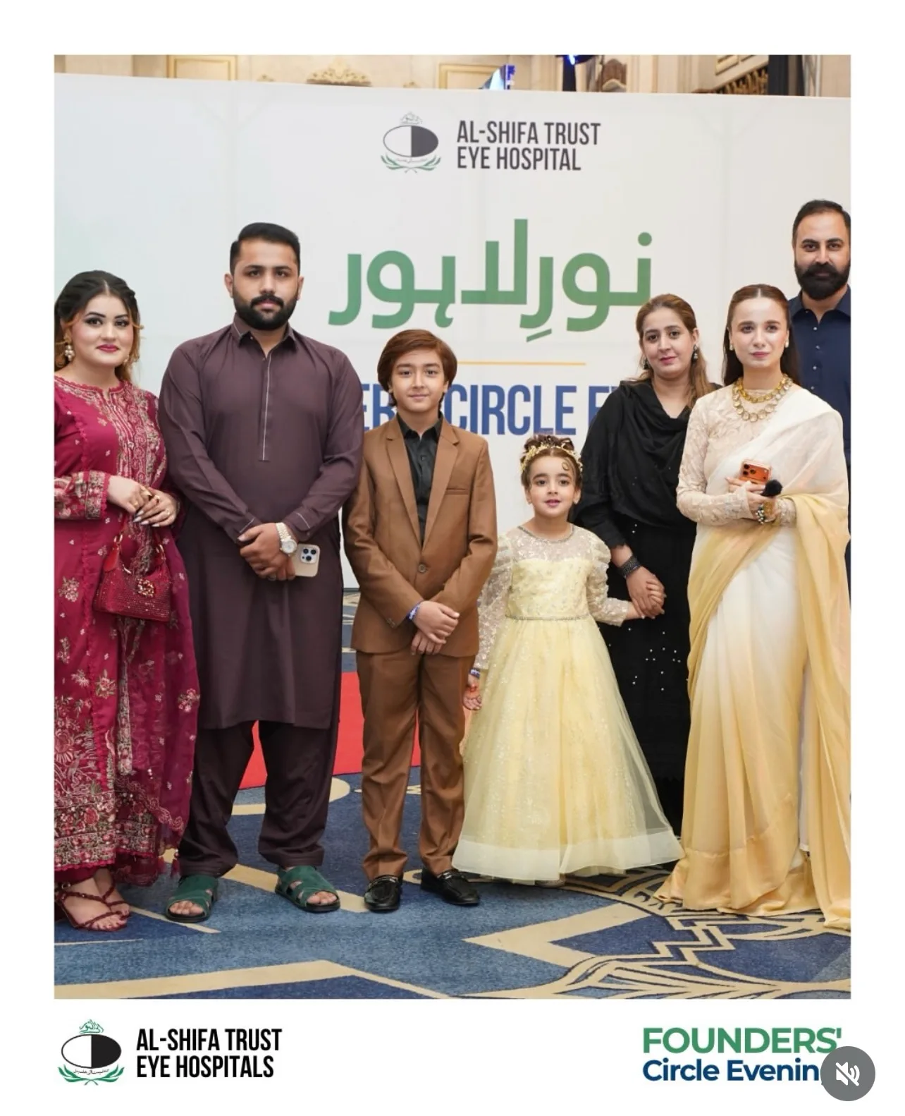 Zartasha Kashif (Tashu), recognized as the World's Youngest Humanitarian, standing on stage at an official event representing her NGO, Hope With Tashu.